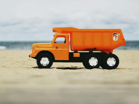 Photo of Orange Dump Truck Toy © Pawel L. Photo of Orange Dump Truck Toy © Pawel L.