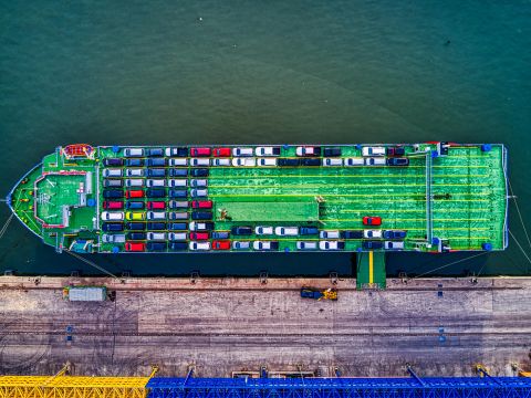 Green Cargo Boat Beside Dock © Tom Fisk Green Cargo Boat Beside Dock © Tom Fisk